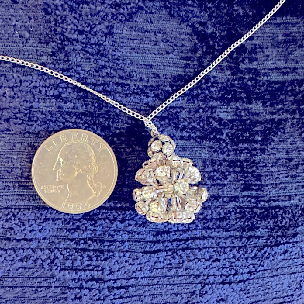 Stamped on clasp sterling chain , with Crystal double starburst pendant